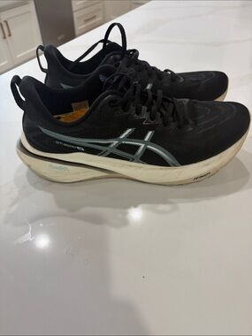 ASICS Black Women’s Running Shoes with Light Blue Accents
